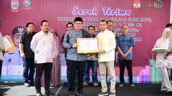 Kadisperkim Kota Makassar Dampingi Wali Kota Makassar  Dalam Serah Terima PSU Perumahan  Dari Pengembang Kepada Pemkot Makassar
