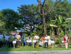 Peringati HUT ke-27, PNM dan DLH Makassar Tanam Tabebuya di Kawasan Monumen Mandala